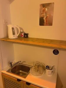 Η κουζίνα ή μικρή κουζίνα στο Jacuzzi Loft in the Center of Riga