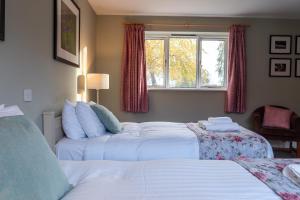 Postel nebo postele na pokoji v ubytování The Plough Inn