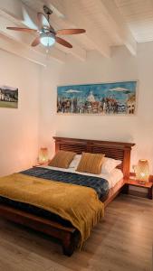 Postel nebo postele na pokoji v ubytování Gîte au bord du Tarn avec ponton et spa