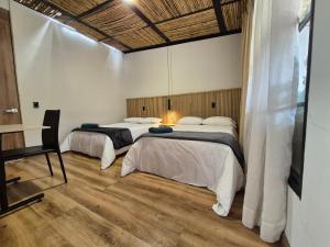 Ένα ή περισσότερα κρεβάτια σε δωμάτιο στο Pepe's House Usaquén Bogotá - Small Hotel +7 φωτογραφίες