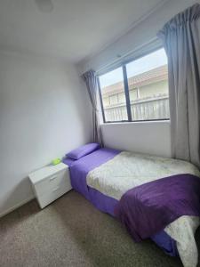 Postel nebo postele na pokoji v ubytování City convenient meets cozy comfort in Riccarton + 4 fotografie