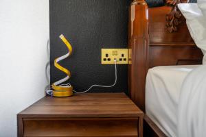 Voodi või voodid majutusasutuse Romantic Seaside Chalet Retreat Solent Breezes toas