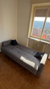 Ένα ή περισσότερα κρεβάτια σε δωμάτιο στο Genzianella