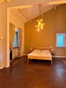 Postel nebo postele na pokoji v ubytování Casa Botanica Boho Chic