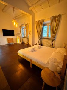 Postel nebo postele na pokoji v ubytování Casa Botanica Boho Chic