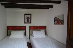 Voodi või voodid majutusasutuse Villa Marcus toas