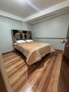 Postel nebo postele na pokoji v ubytování Hogar Mesco