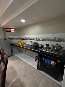 Kuchyň nebo kuchyňský kout v ubytování Hogar Mesco