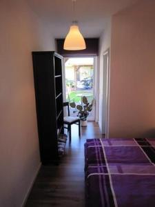 Postel nebo postele na pokoji v ubytování Charmante Wohnung In Malchow + 1 fotografie