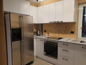 Η κουζίνα ή μικρή κουζίνα στο Fresh and funky apartment in Falls Creek +5 φωτογραφίες