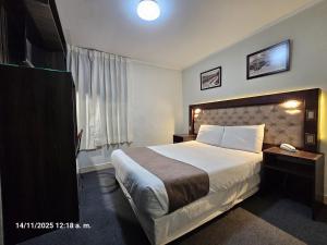 Ένα ή περισσότερα κρεβάτια σε δωμάτιο στο Rivero 520 +1 φωτογραφίες