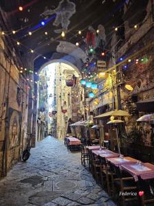 En restaurant eller et andet spisested på Le 2 sorelle Luxury Rooms