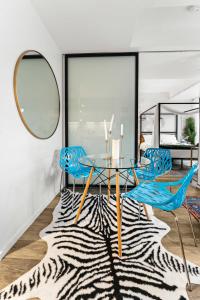 Posezení v ubytování One-Bedroom Retreat in the South End + 55 fotografií