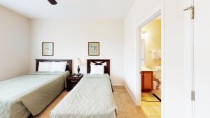 Voodi või voodid majutusasutuse Village at the Glens S 202 toas +4 fotot