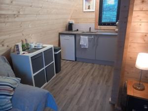 a room with a kitchen and a sink at Mountain View in Tipperary +18 photos