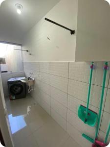 Koupelna v ubytování Apto Novo Jardim Rosinha