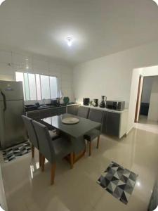 Posezení v ubytování Apto Novo Jardim Rosinha + 20 fotografií