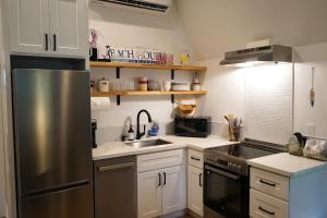 Η κουζίνα ή μικρή κουζίνα στο The Loft