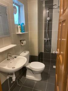 a bathroom with a toilet and a sink and a shower at Jo’s Place Cameron Highlands EA922 in Brinchang +46 photos