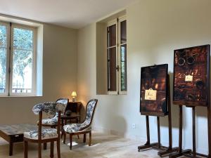 Posezení v ubytování Gîte élégant avec jardin privé, vue sur château - FR-1-586-7