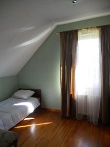 Postel nebo postele na pokoji v ubytování Vētras
