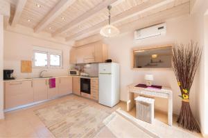 Kuchyň nebo kuchyňský kout v ubytování Ferienhaus In Kolympia Mit Privatem Garten