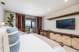 Ένα ή περισσότερα κρεβάτια σε δωμάτιο στο 3Bed condo with Pool Ocean views