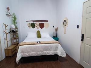 Giường trong phòng chung tại Casa Velas