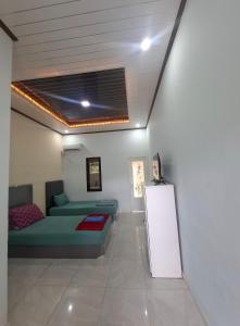 Posezení v ubytování Mangkulio Guest House