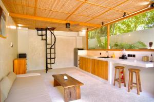 Η κουζίνα ή μικρή κουζίνα στο Casa Cabana Solah Villas