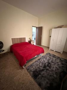 En eller flere senge i et værelse på Apartamento Completo + 2 billeder