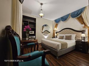 Una cama o camas en una habitación de Gya Hoteles