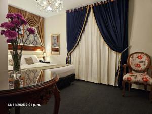 Una cama o camas en una habitación de Gya Hoteles