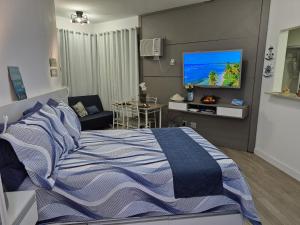 TV a/nebo společenská místnost v ubytování Loft Melhor do Sahy - Magaratiba RJ