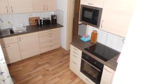 Kuchyň nebo kuchyňský kout v ubytování Fewo Am Skihang Og