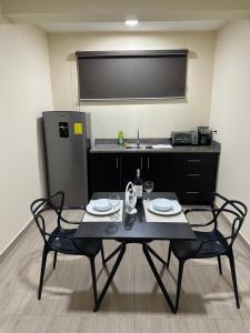 Η κουζίνα ή μικρή κουζίνα στο Apartamento en Manta +7 φωτογραφίες