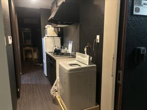 Kuchyň nebo kuchyňský kout v ubytování LEGALCOURT - Vacation STAY 17899