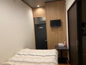 Postel nebo postele na pokoji v ubytování LEGALCOURT - Vacation STAY 18279