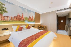 Ένα ή περισσότερα κρεβάτια σε δωμάτιο στο Shanghai Jiarong Hotel Apartment