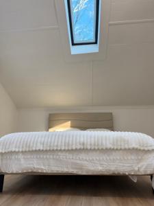 Ένα ή περισσότερα κρεβάτια σε δωμάτιο στο King Cabin