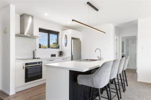 Kuchyň nebo kuchyňský kout v ubytování Driftwood Dreams