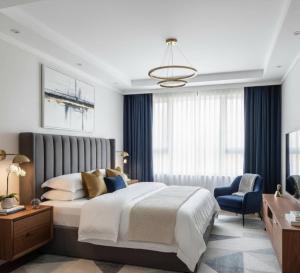 Ένα ή περισσότερα κρεβάτια σε δωμάτιο στο Stylish Apartment with 2 bedroom & relaxation space