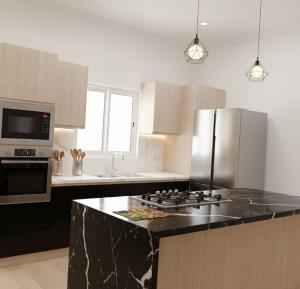 Η κουζίνα ή μικρή κουζίνα στο Stylish Apartment with 2 bedroom & relaxation space