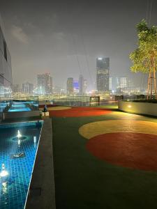 a view of a city skyline from a building at Cozy Room In Abu Dhabi Reem island Near to Galeria Mall in Abu Dhabi