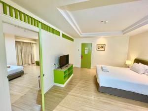 Postel nebo postele na pokoji v ubytování Friendlytel Hotel + 47 fotografií