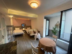 Ένα ή περισσότερα κρεβάτια σε δωμάτιο στο CHARM CHARM - kimmy housing - 48 To Ngoc Van