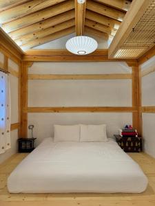 Ένα ή περισσότερα κρεβάτια σε δωμάτιο στο 소곤정