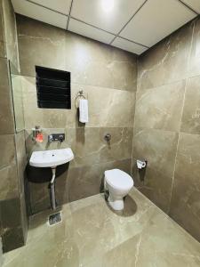 Vannituba majutusasutuses Fun Hotel Rajkot