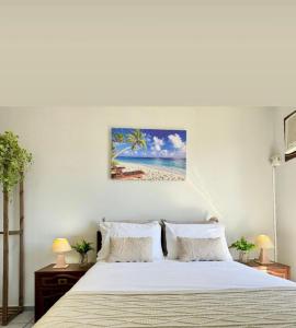 En eller flere senge i et værelse på Residencial Nosso Sonho - Aptos Completos 150m do Mar com Piscina + 21 billeder