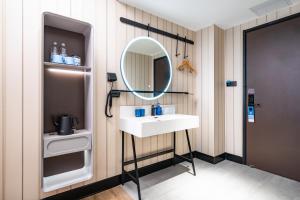 Koupelna v ubytování Hanting Hotel Shenzhen Coast City Nanyou Clothing City